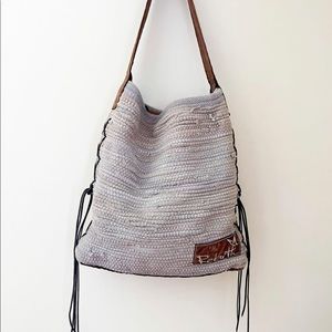 woven tote with leather accents